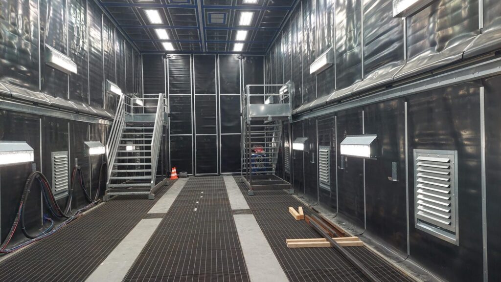Cabine de grenaillage à plancher racleur avec génie civil, photo 11